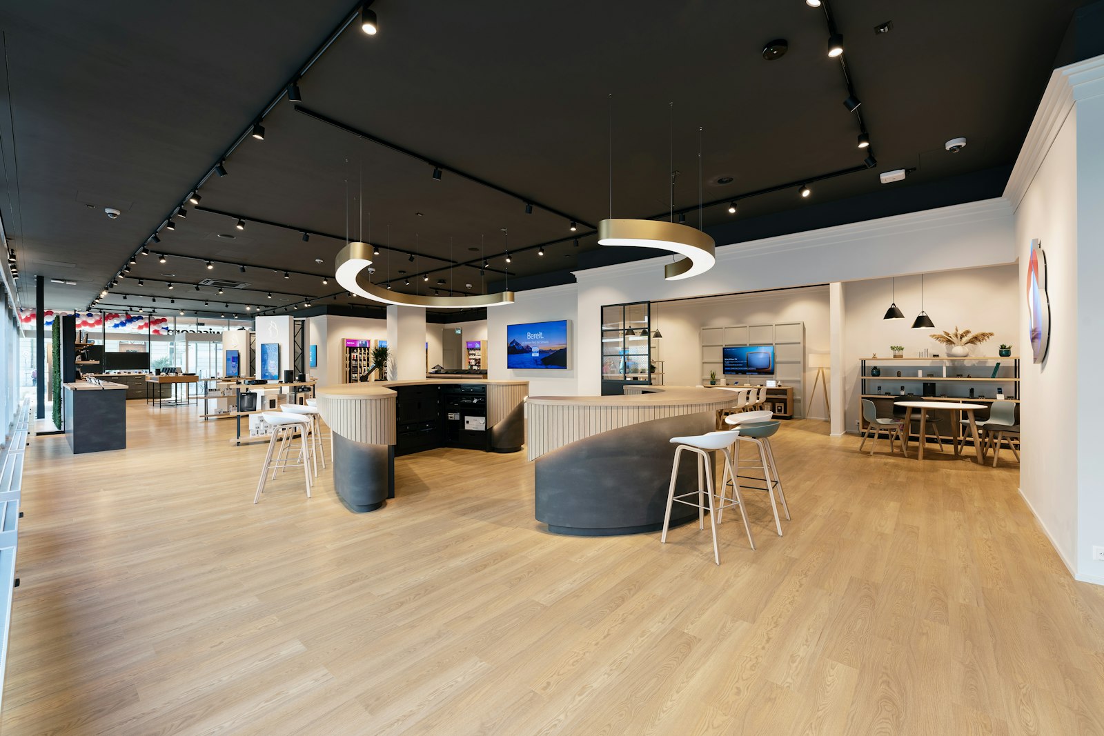 Swisscom shop interior featuring furniture and consultation islands crafted by Erich Keller
