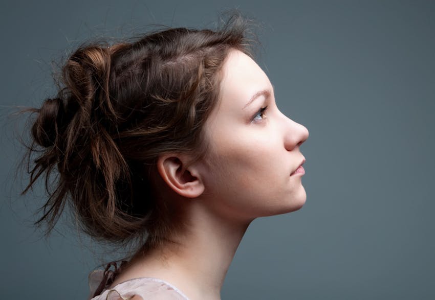 woman with brown hair in an updo
