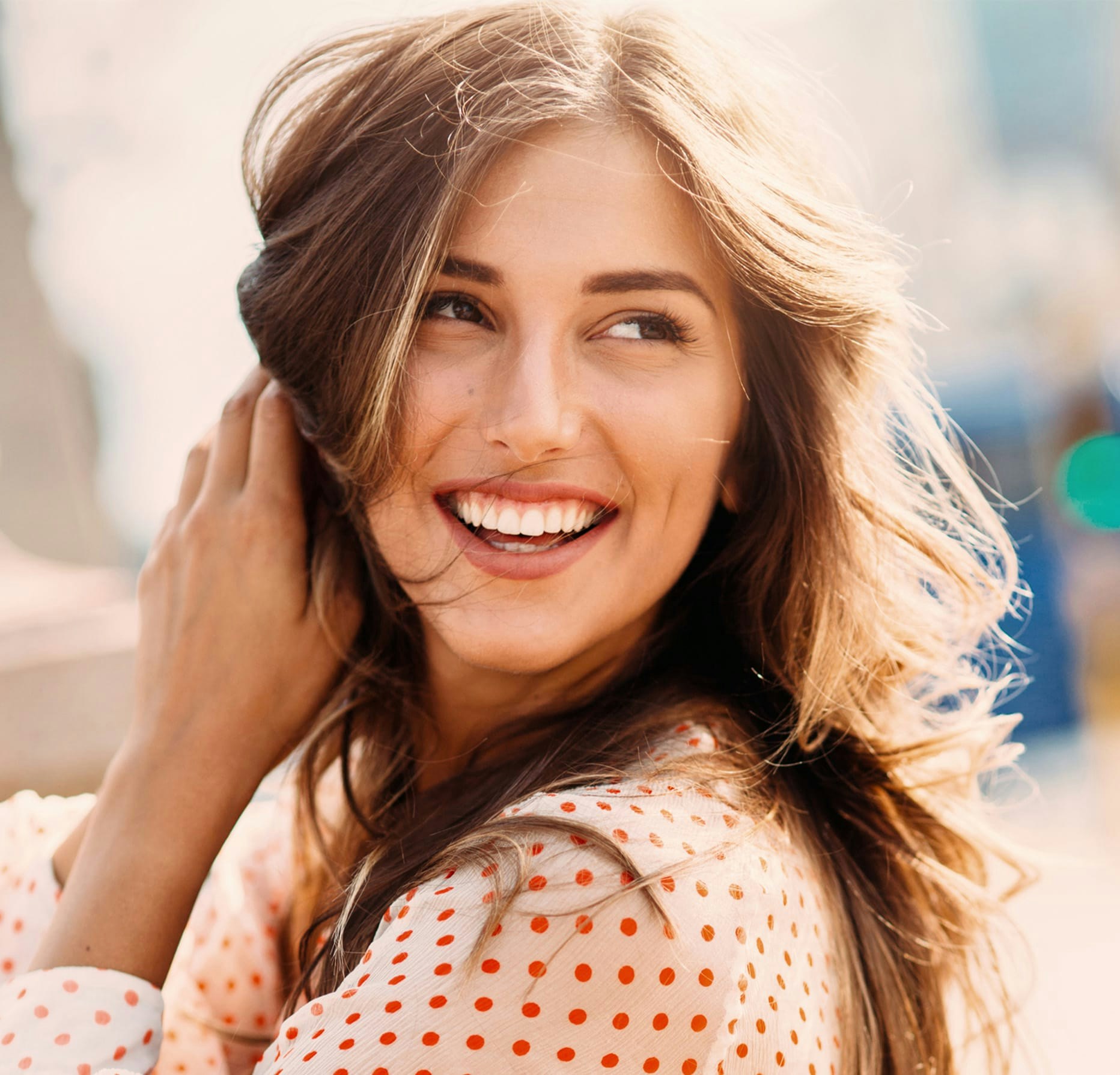 Woman touching her hair