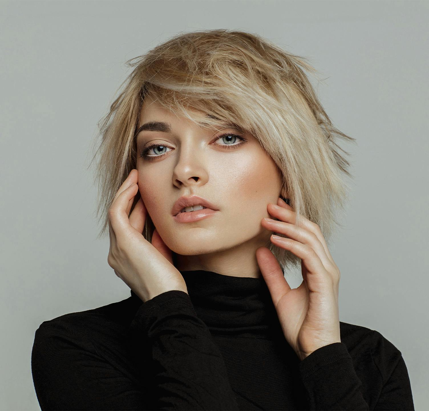 Woman touching her face