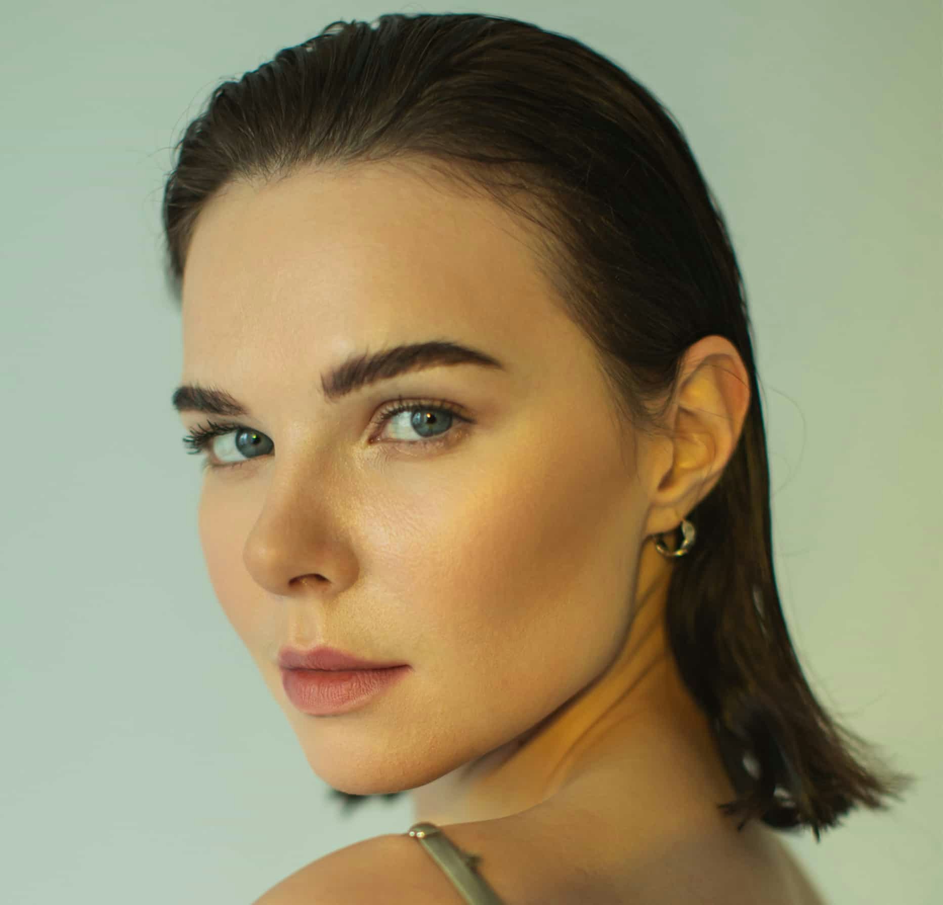 Woman looking over her shoulder