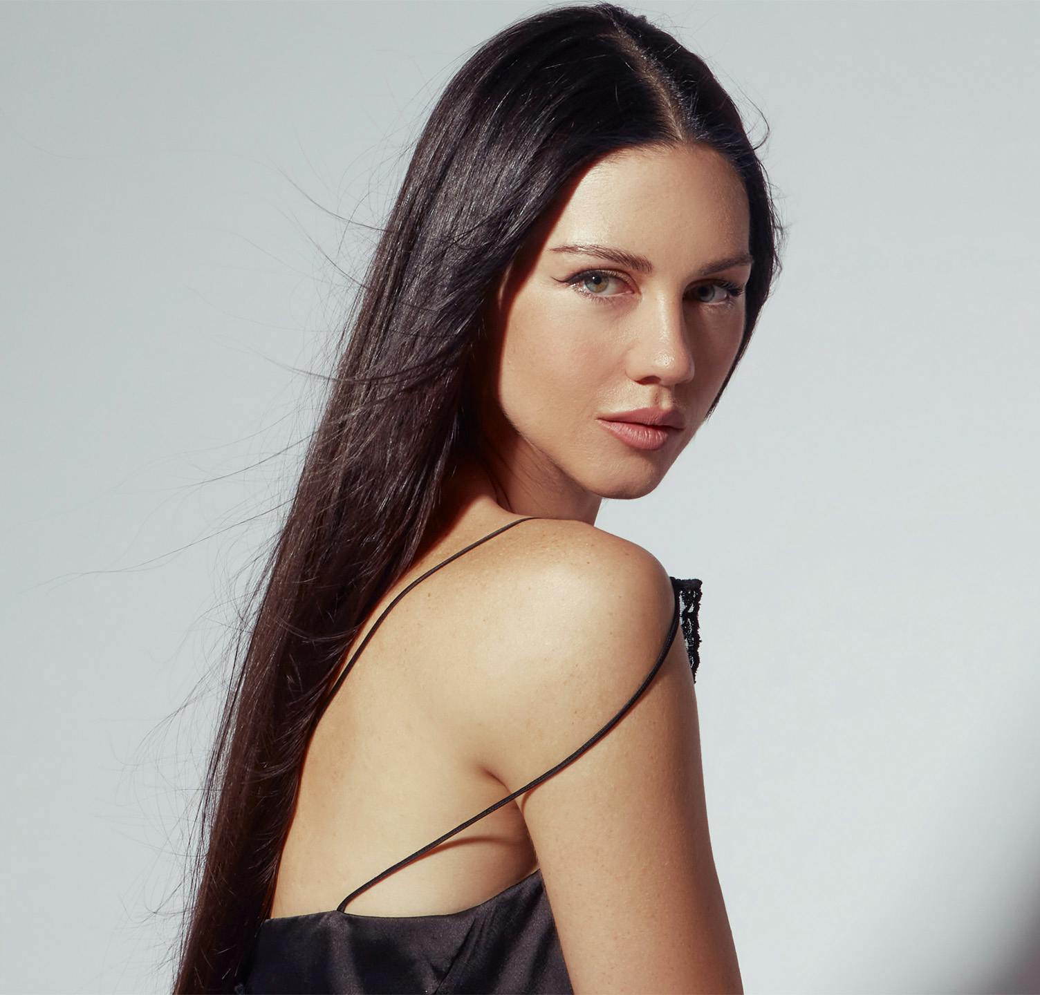 Woman looking over her shoulder