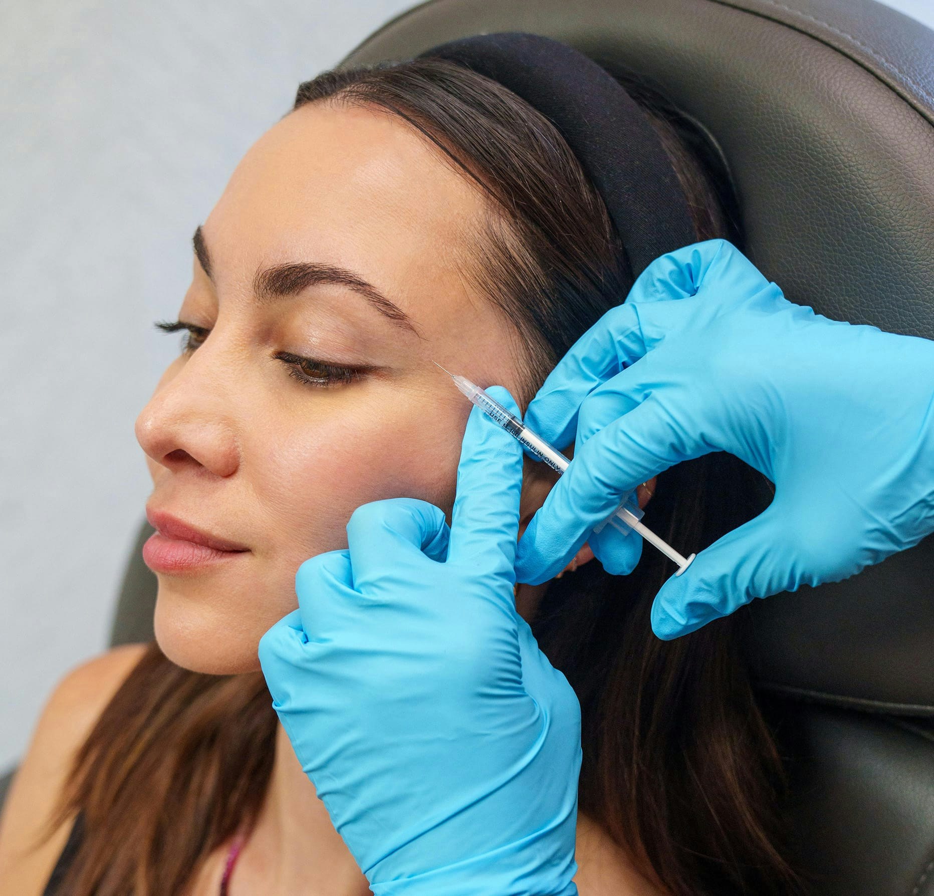 Woman getting an injection