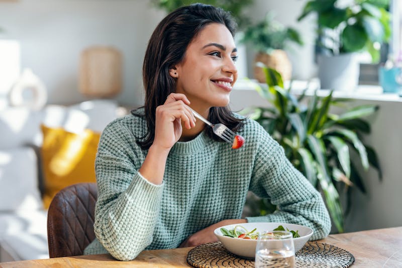 Woman eating a salad