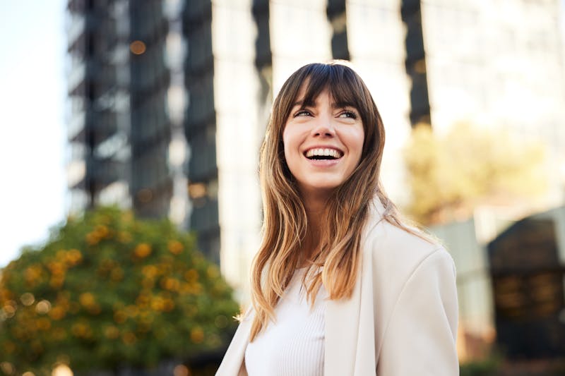 woman smiling outside
