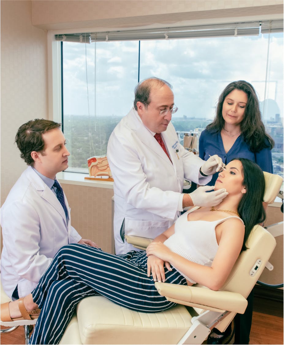 Doctor's helping a patient