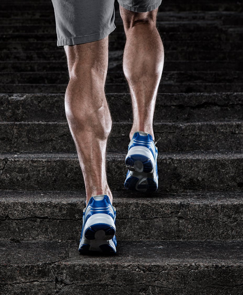 man running up steps