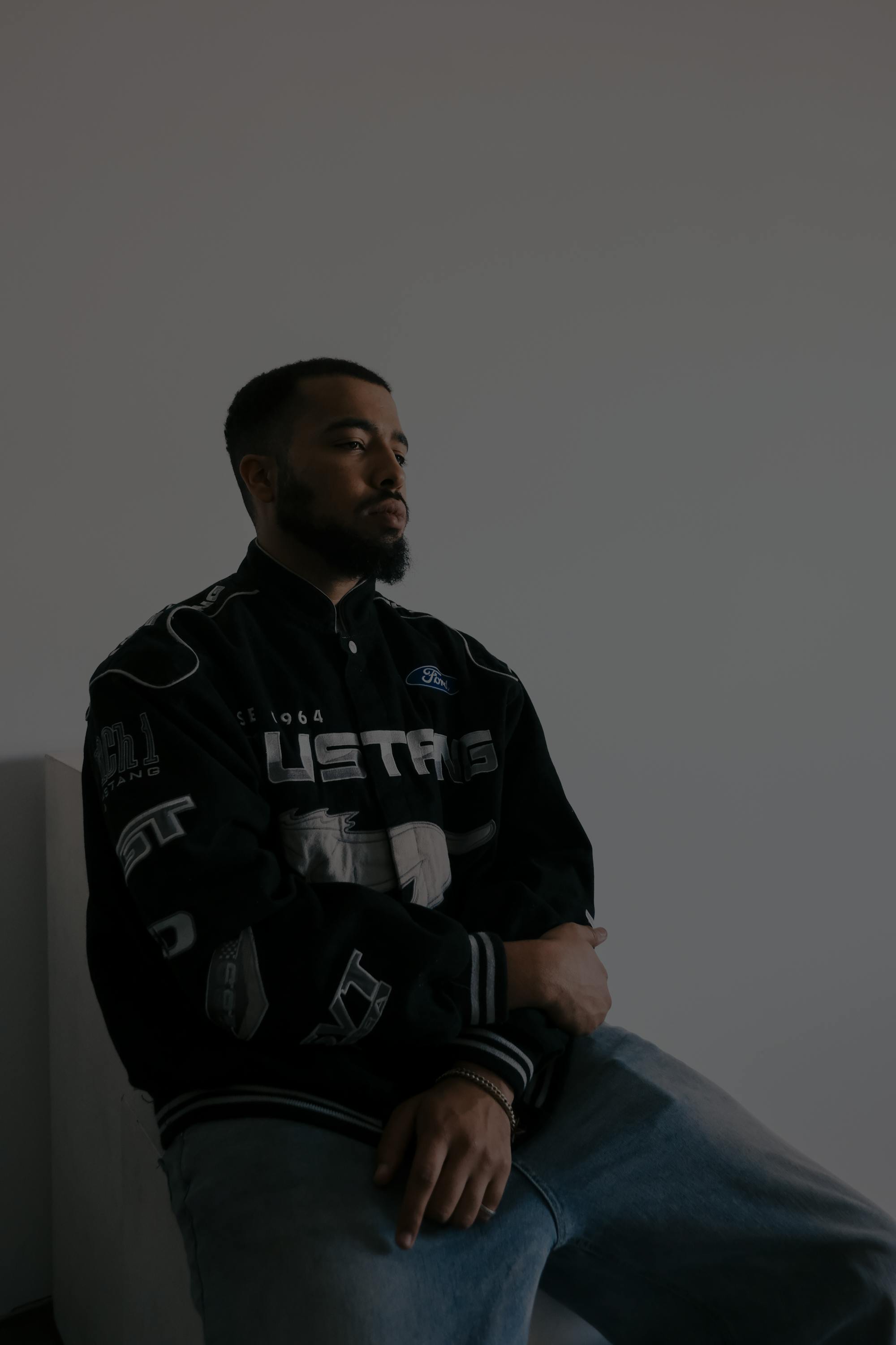 mynameisntjmack sitting in front of a white background