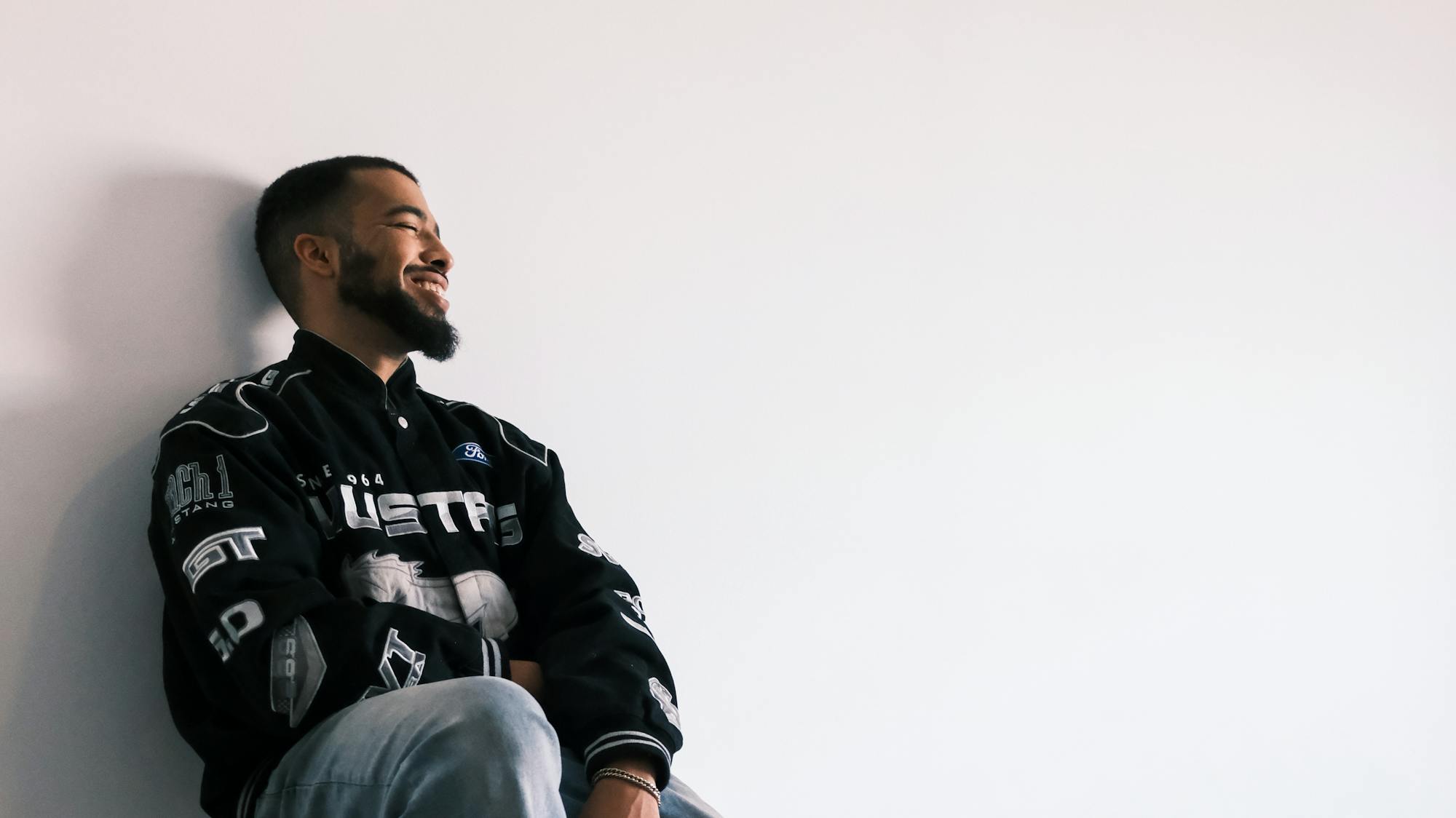 mynameisntjmack sitting on white blocks