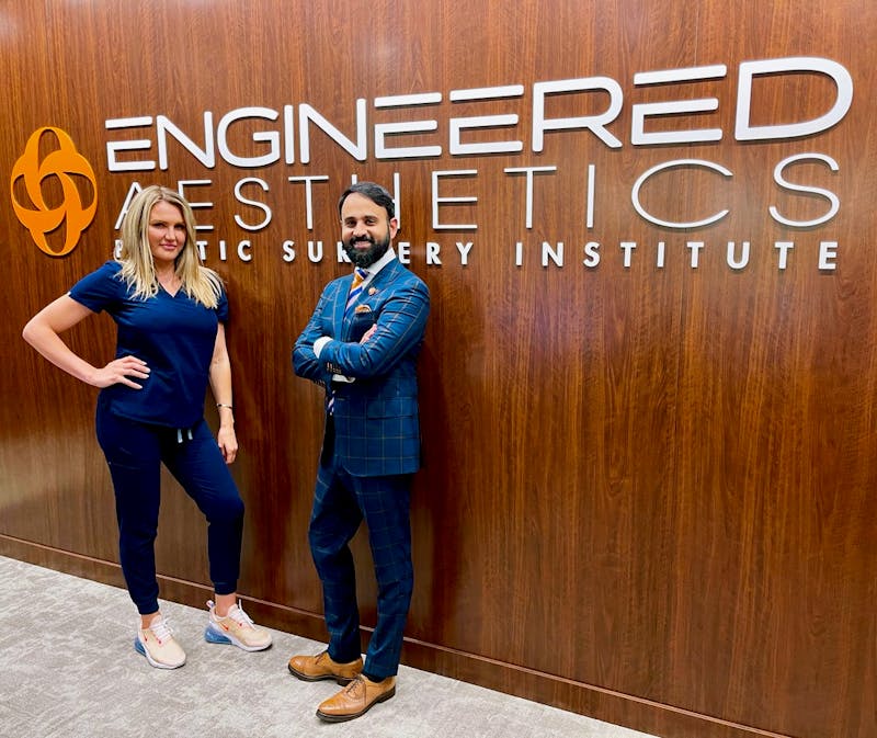 Dr. Engineer and RN in front of the office
