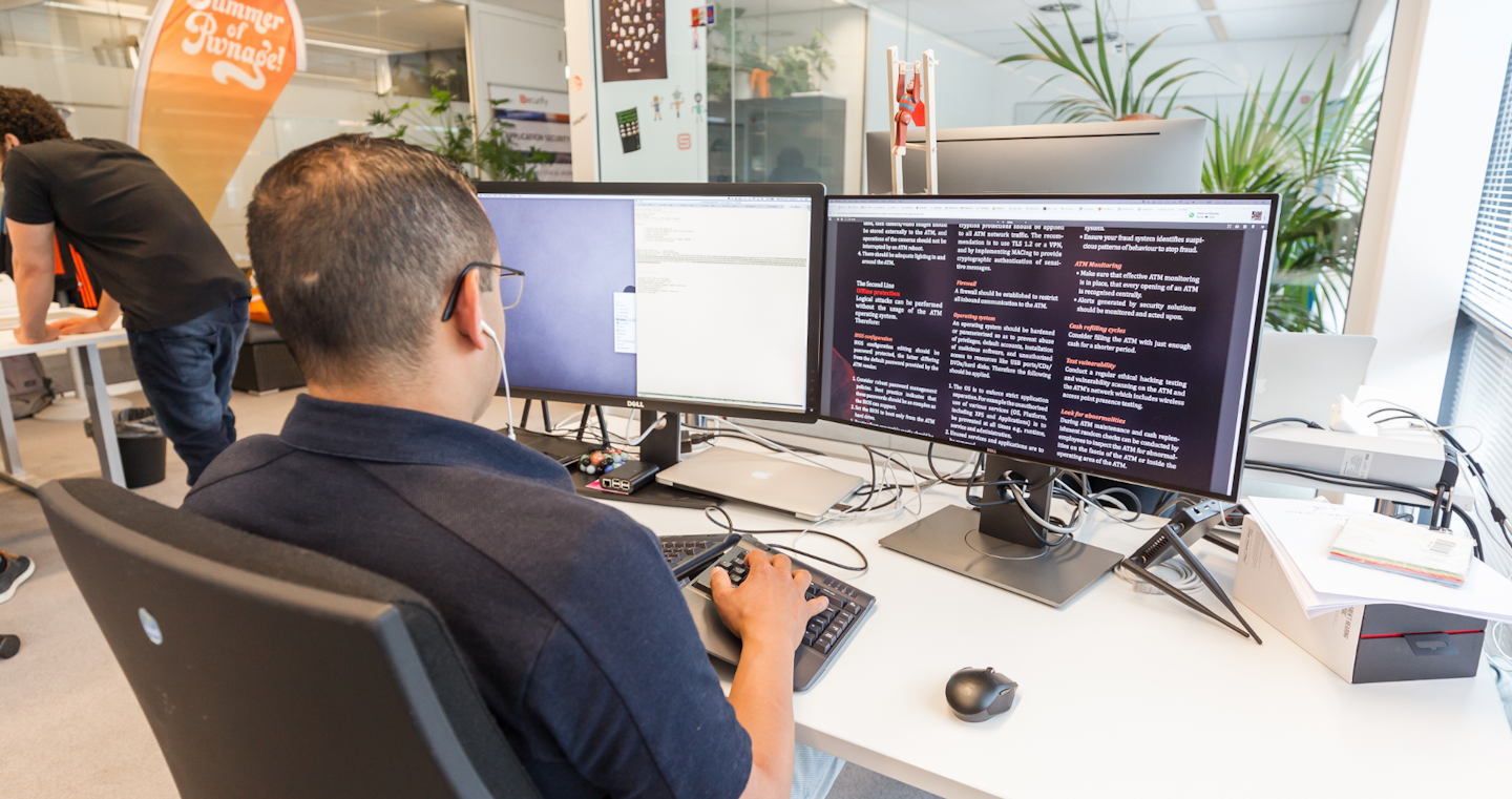 Man at work behind desk