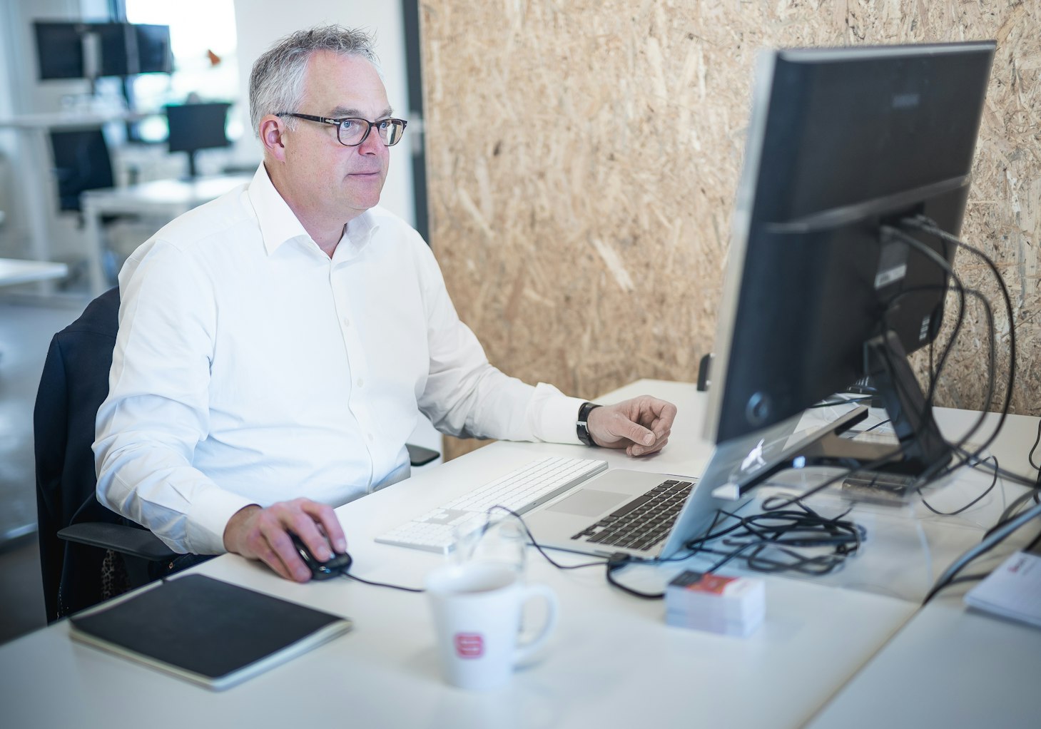 Man behind computer