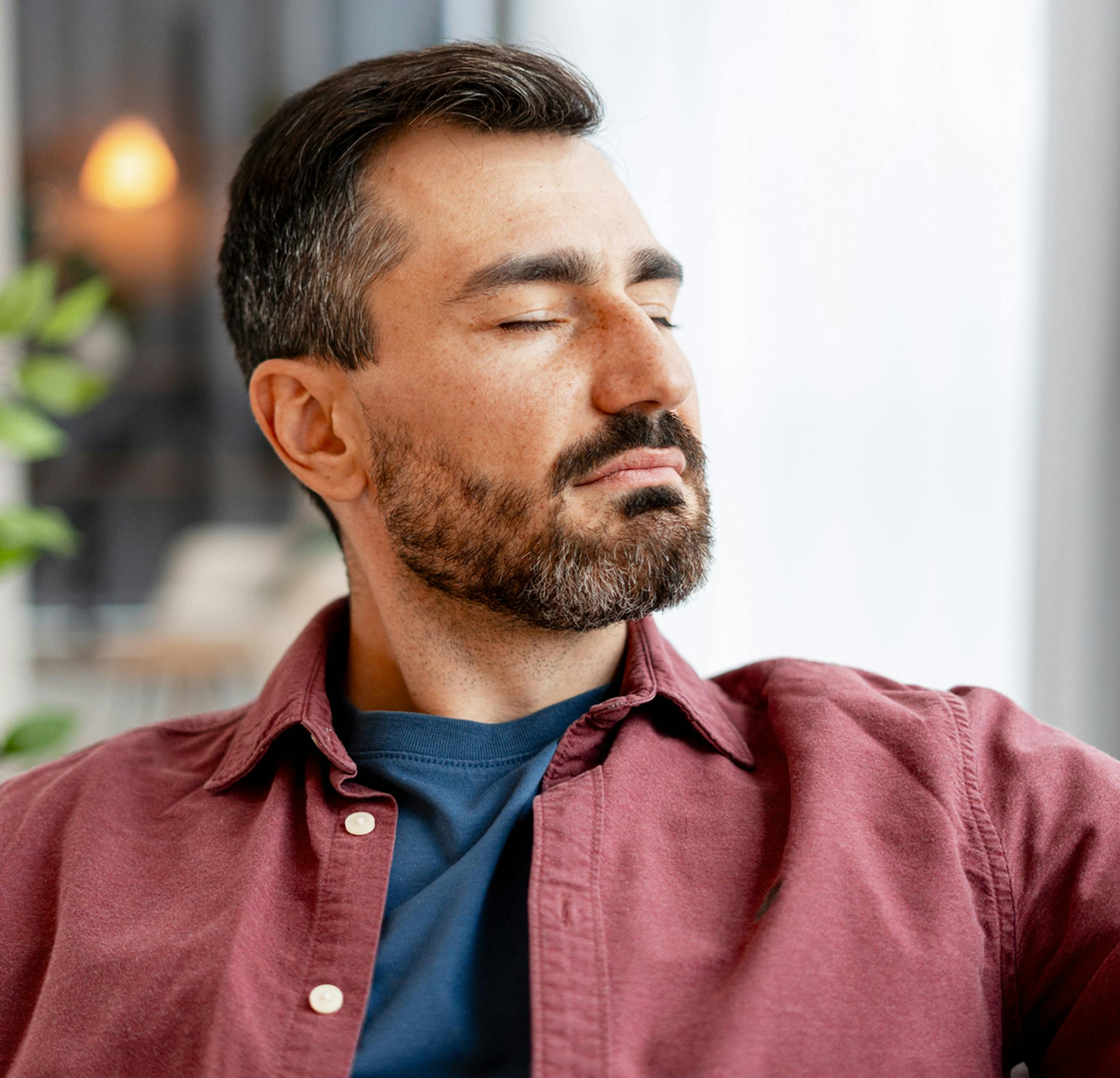 man closing his eyes