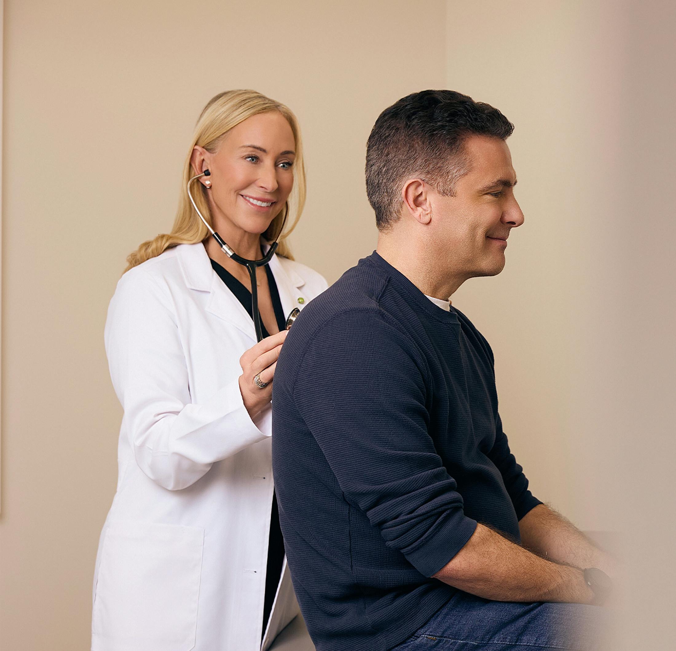 Doctor helping a patient