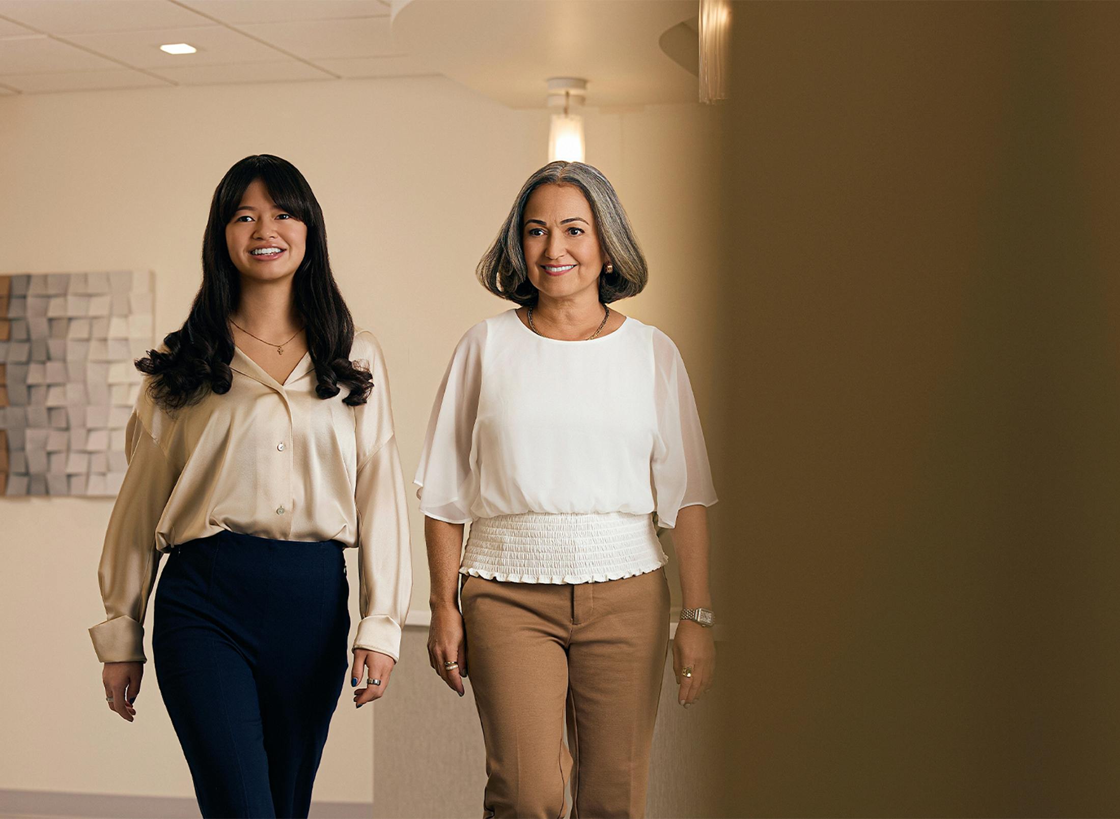 two woman walking