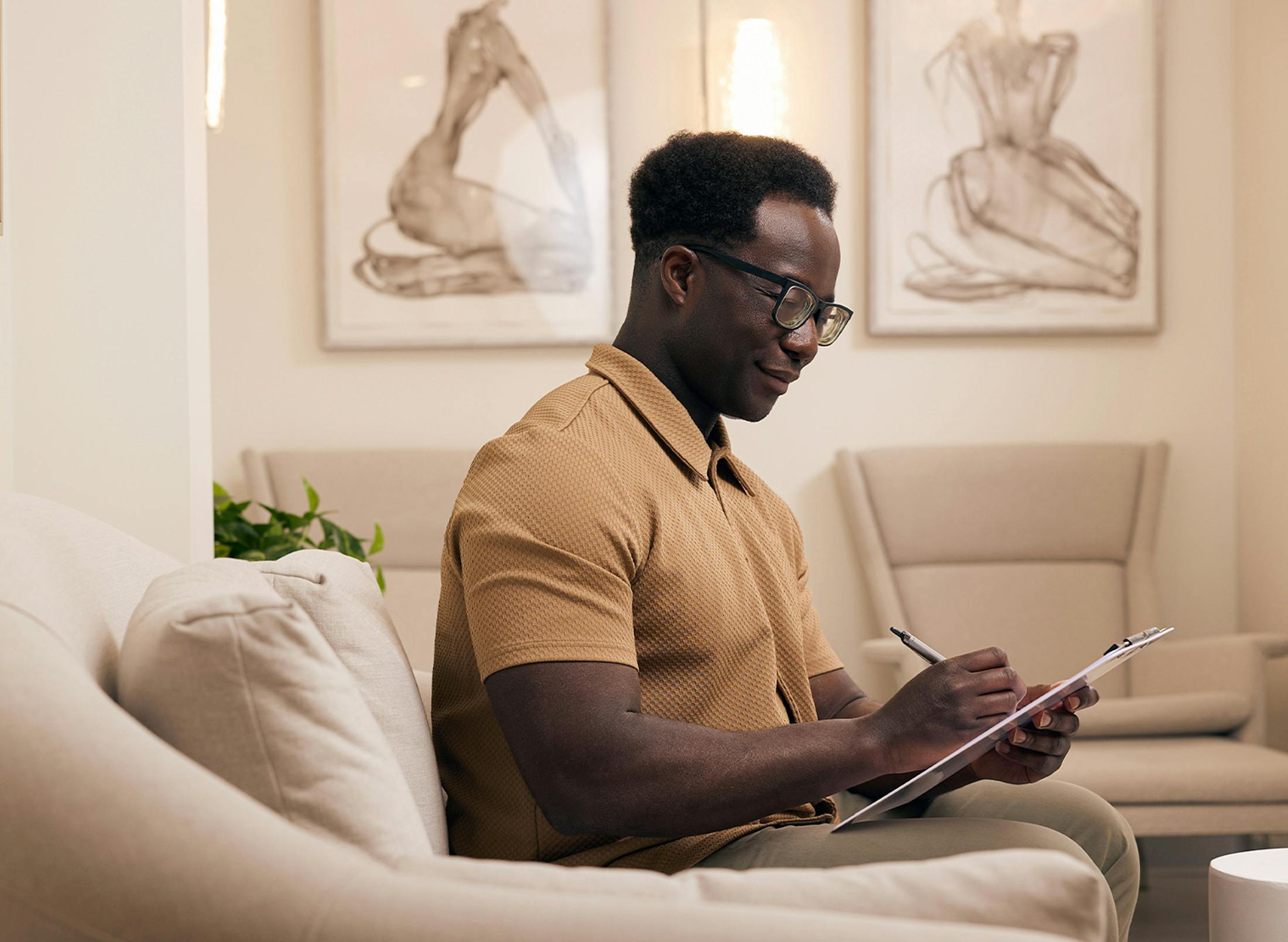 man filling out paperwork