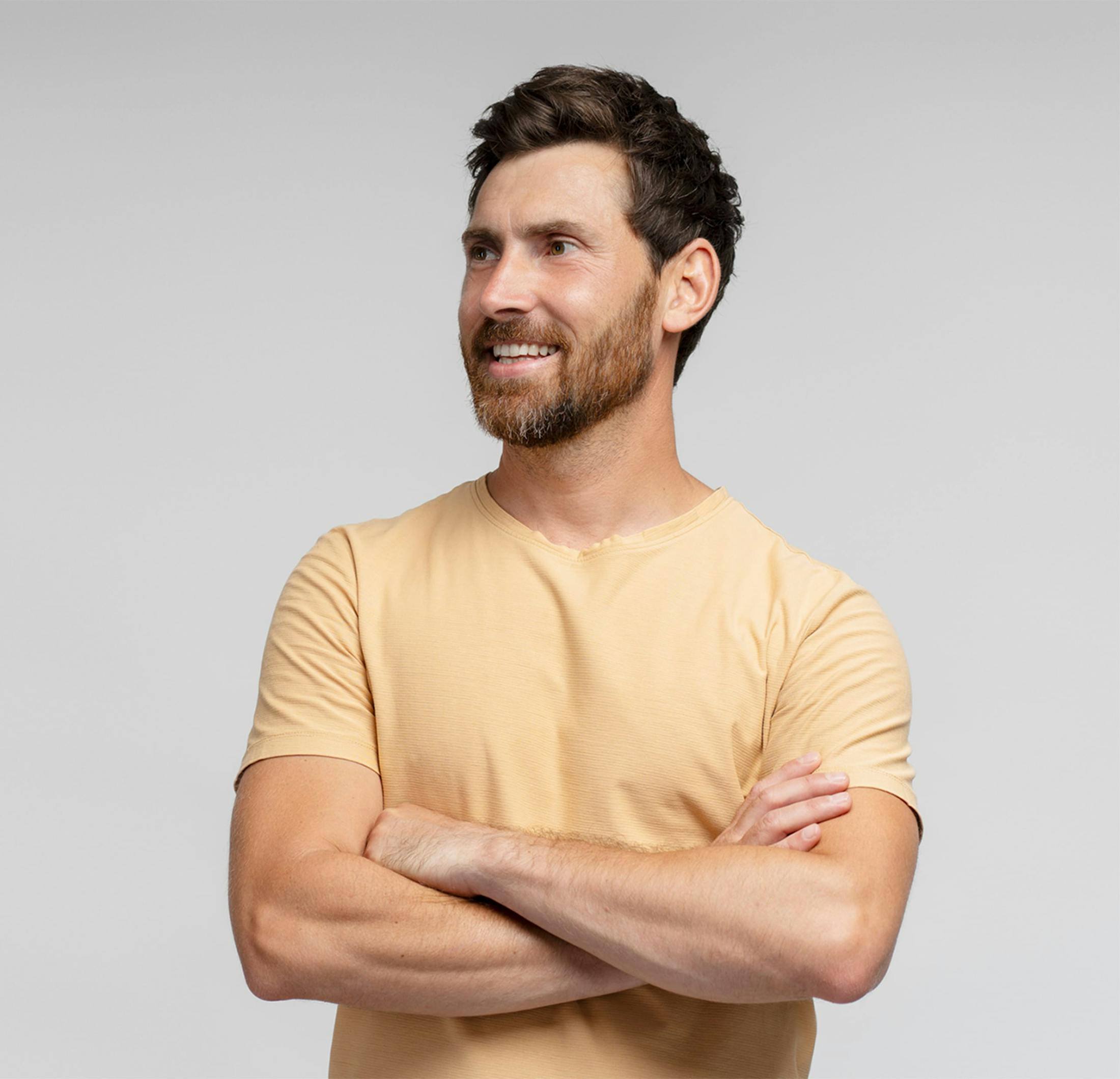 man in a yellow shirt