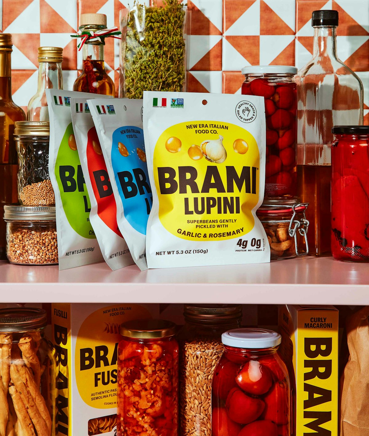 Brami lupini bean packaging displayed on a pantry shelf with jars, bottles and Italian food staples.