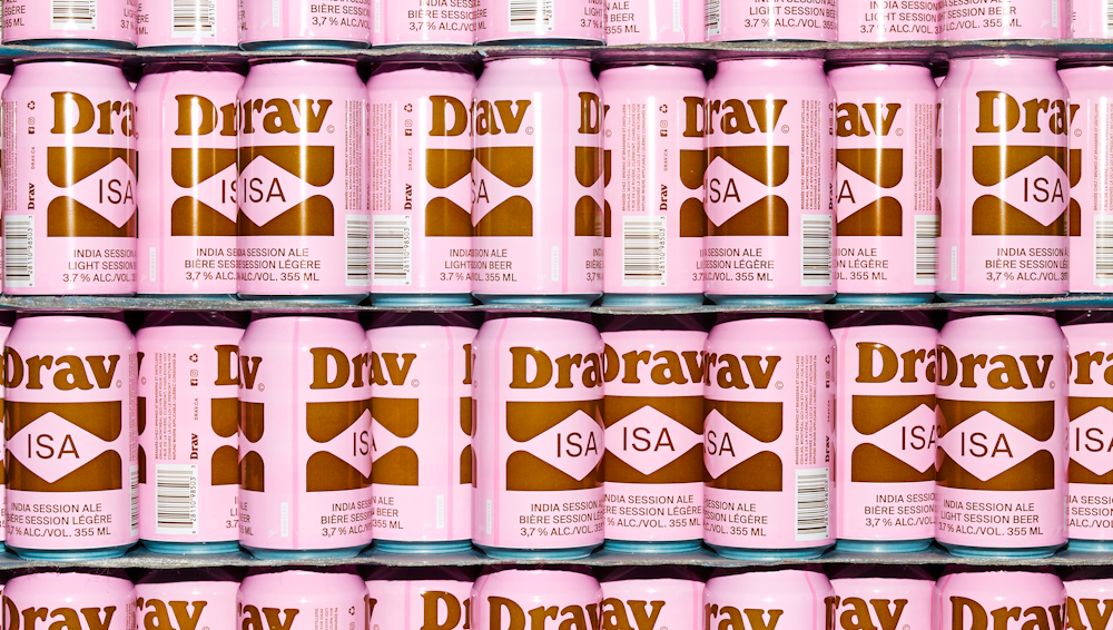 A stack of Drav ISA beer cans.