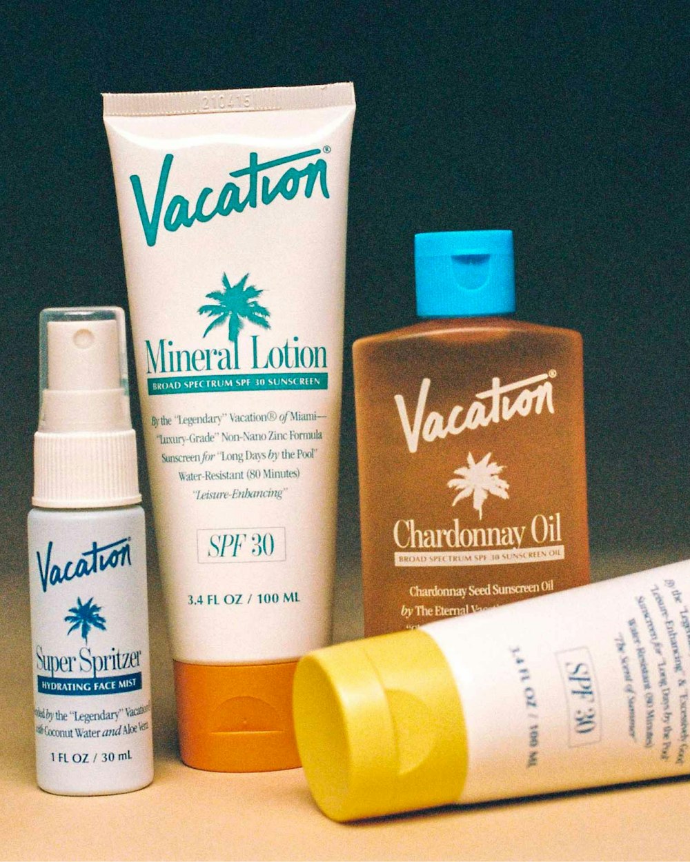 Vacation packagings line-up with 4 products on a gradient background.