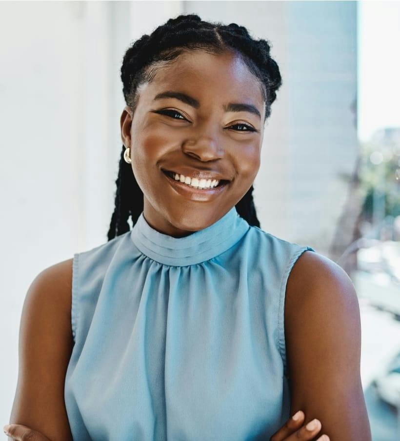 smiling woman with blue shirt
