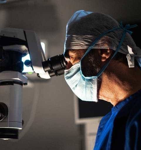eye doctor performing eye exam