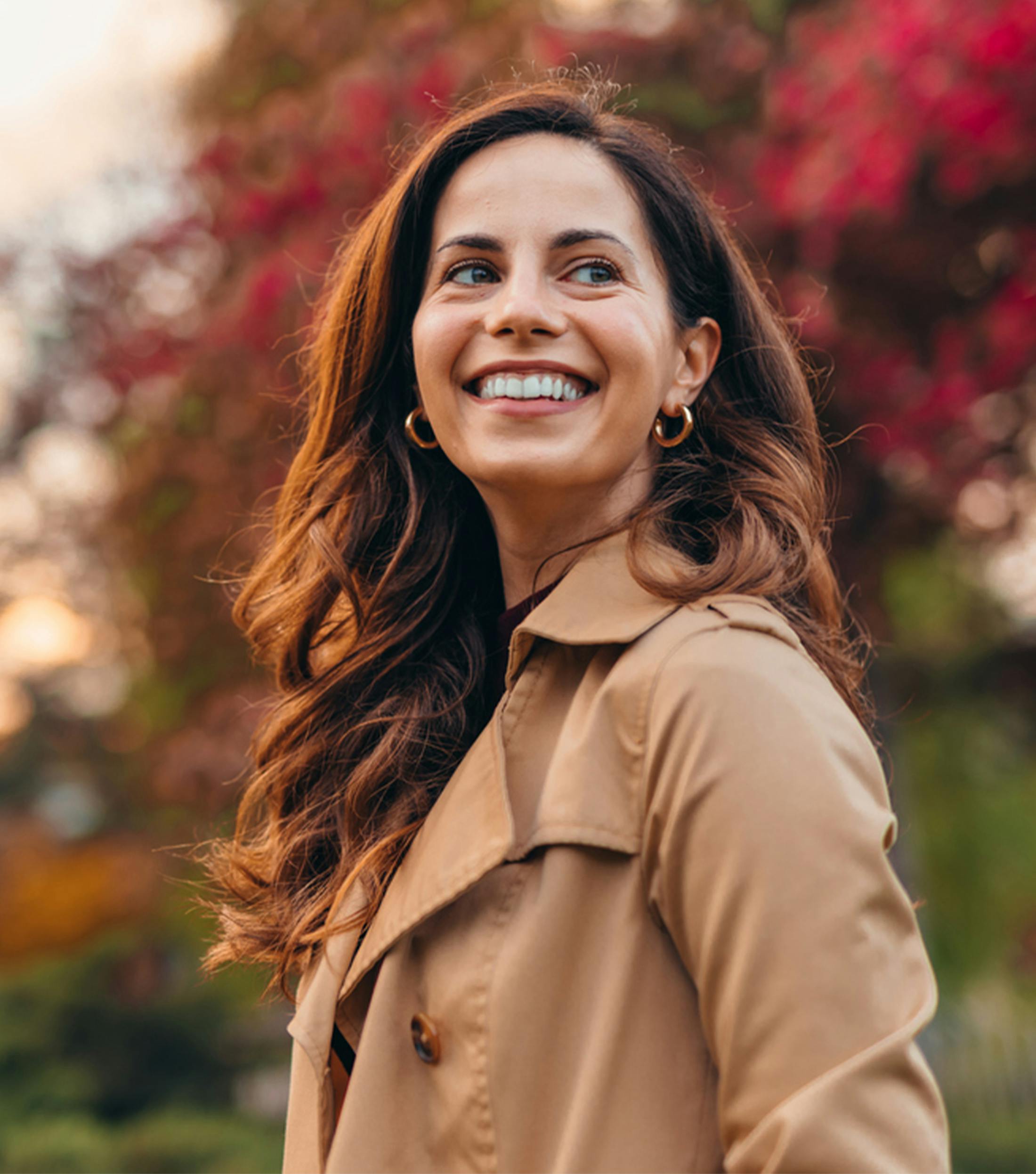woman smiling over her shoulder