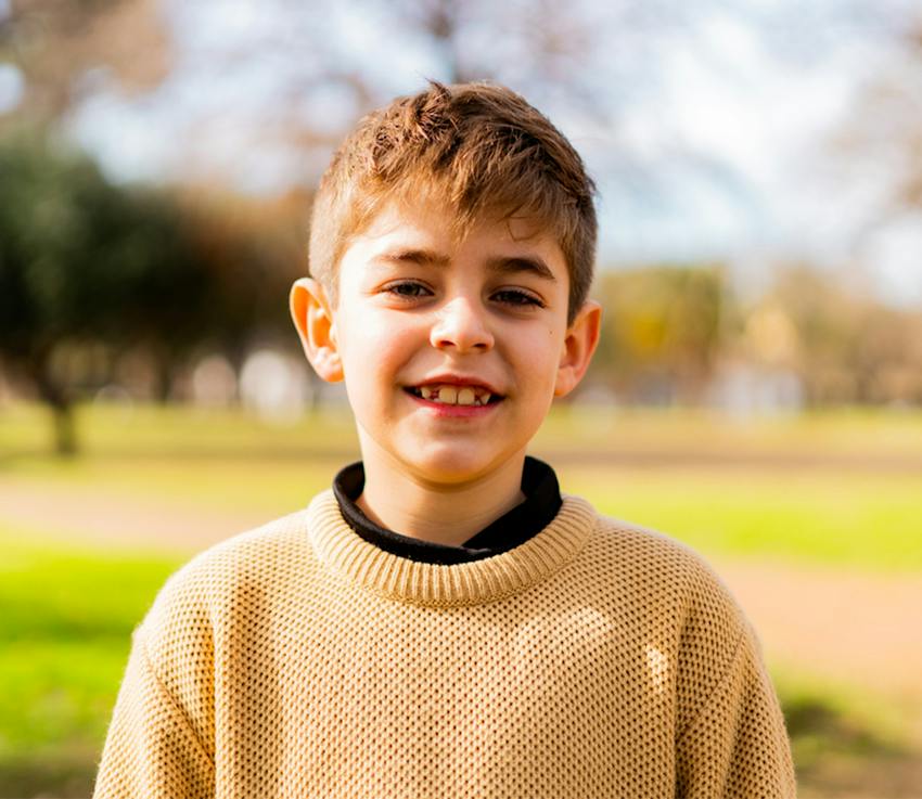 young boy smiling