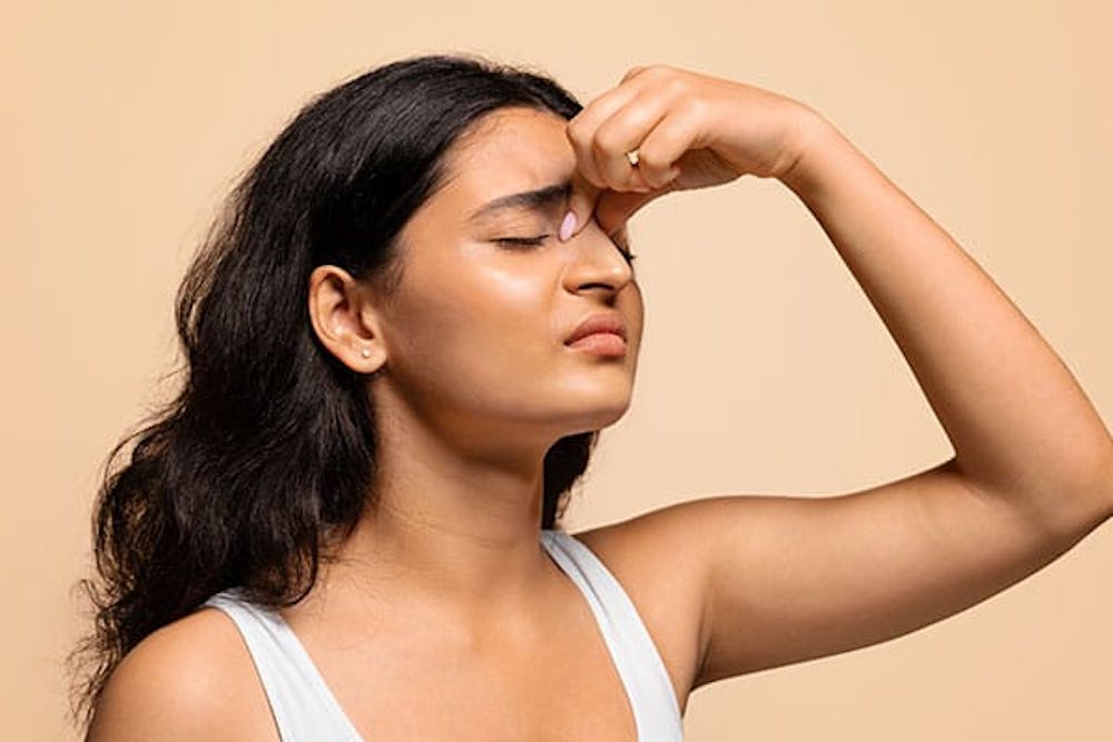 woman with a deviated septum who is considering a rhinoplasty in Miami