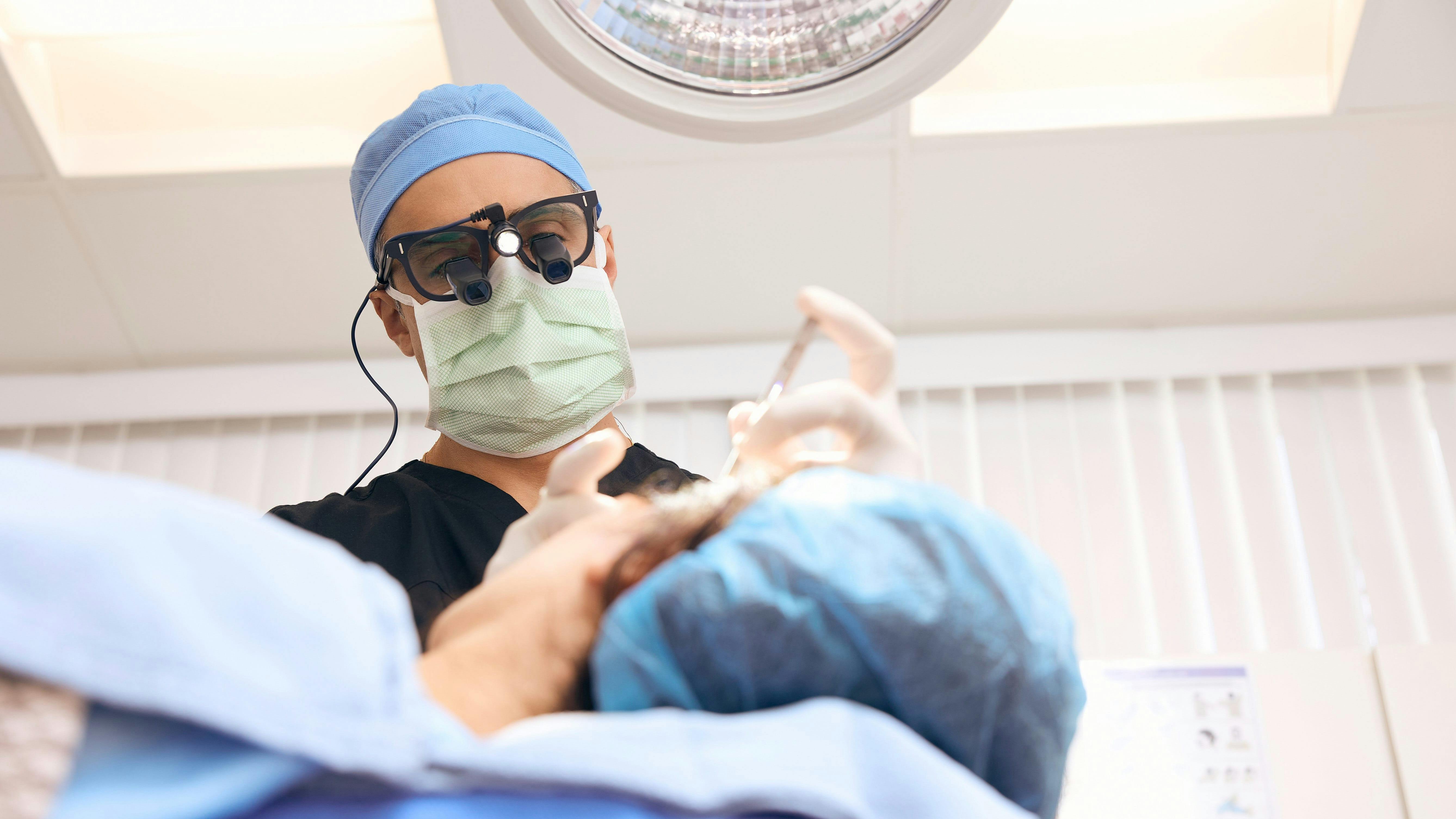 Dr. Bared performing surgery