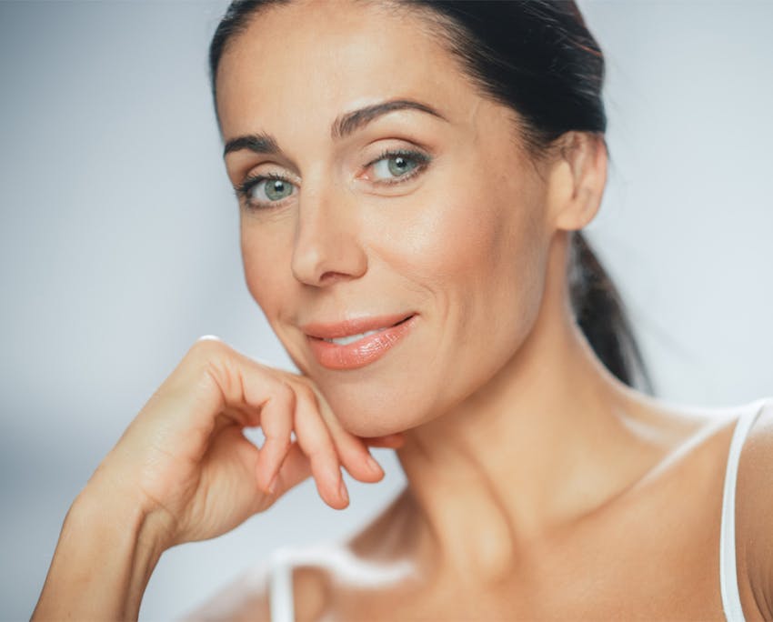woman touching chin