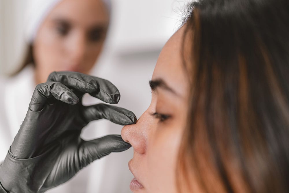 teen girl having a rhinoplasty consultation in Miami, FL