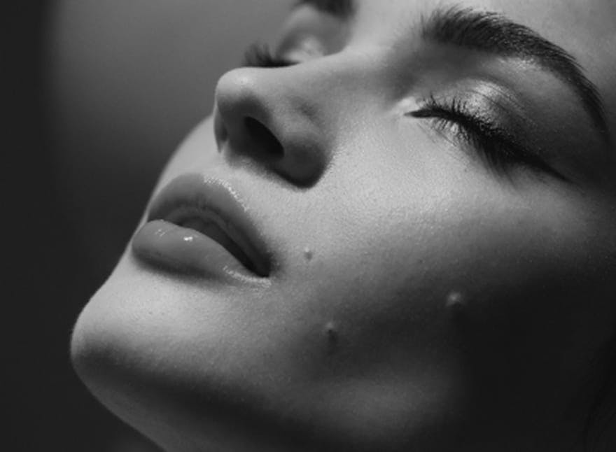 woman with her eyes closed