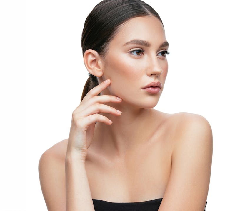 Woman touching her cheek