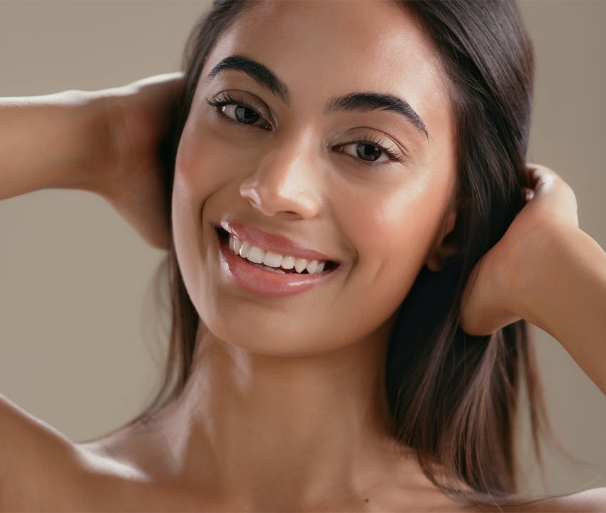 women holding her hair