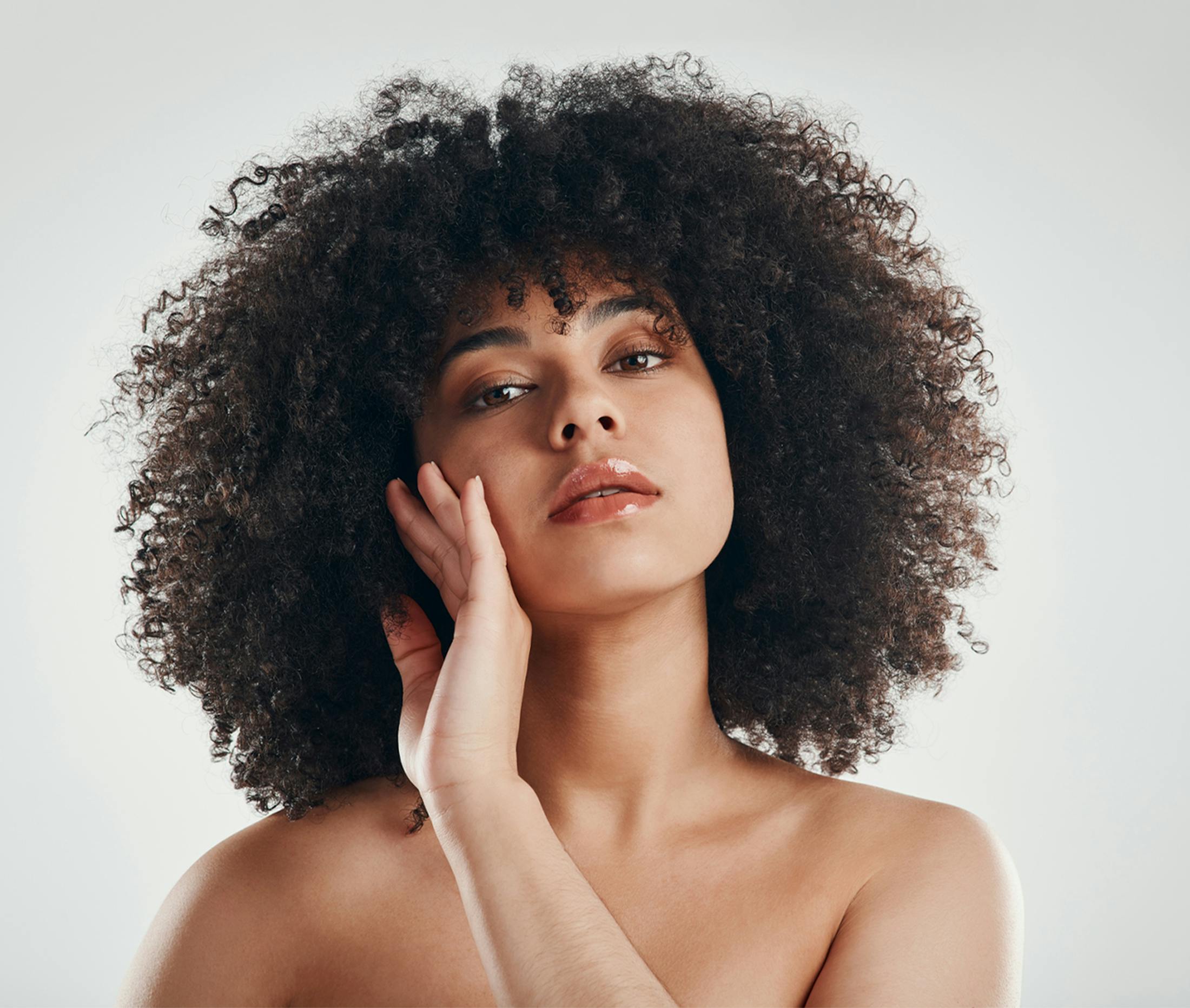 women holding her face