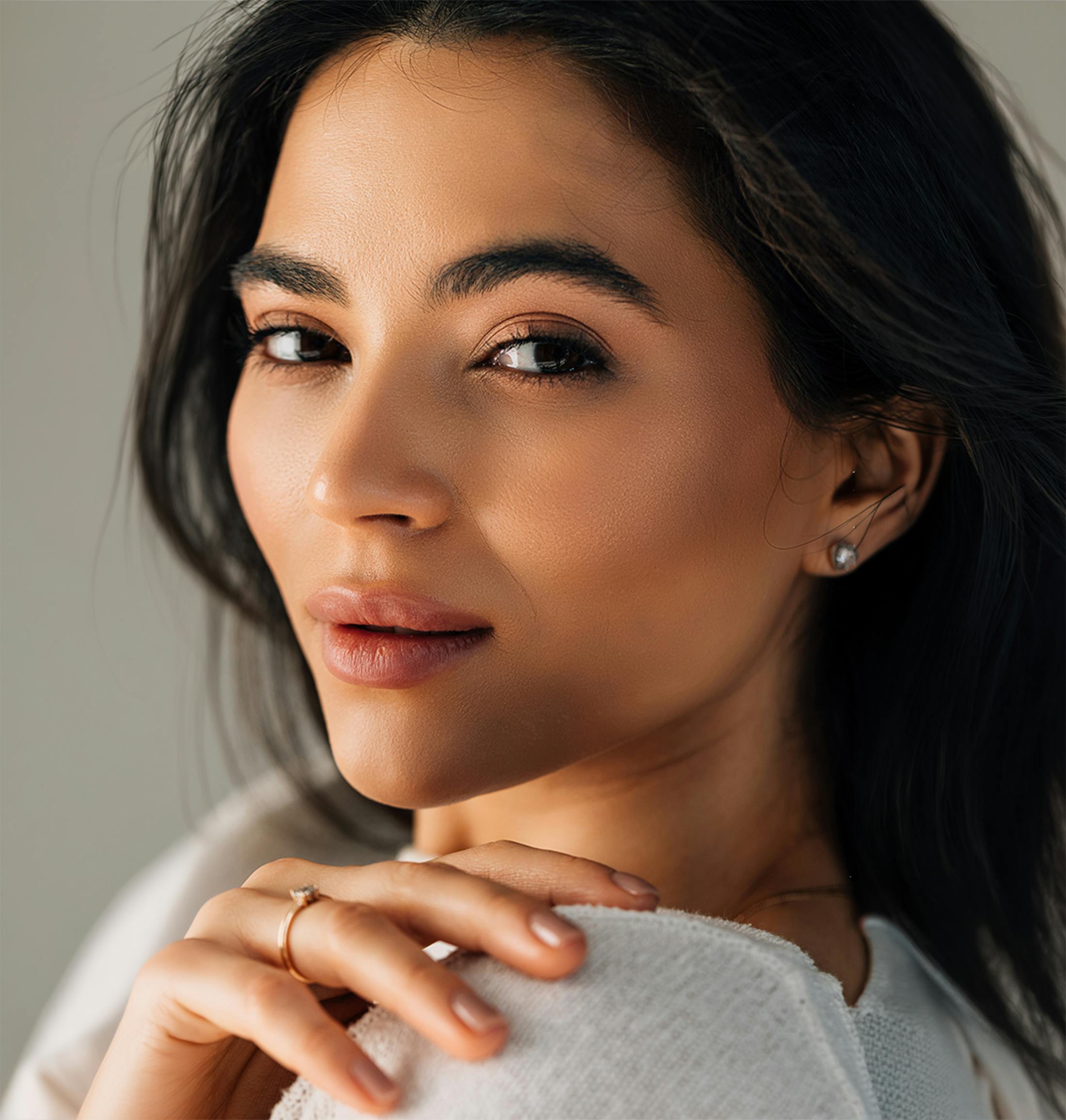 Woman looking over her shoulder