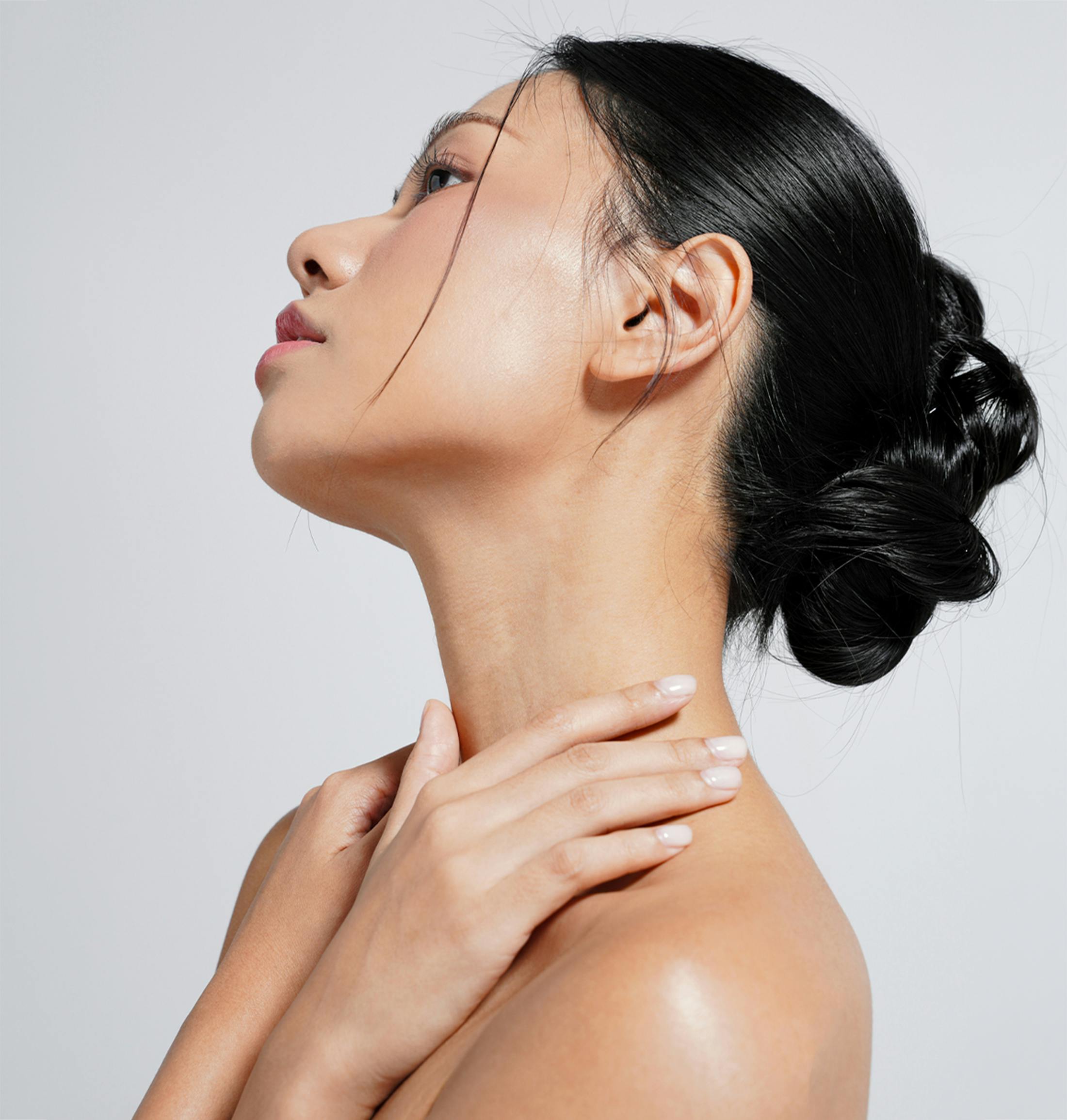 women grabbing her neck