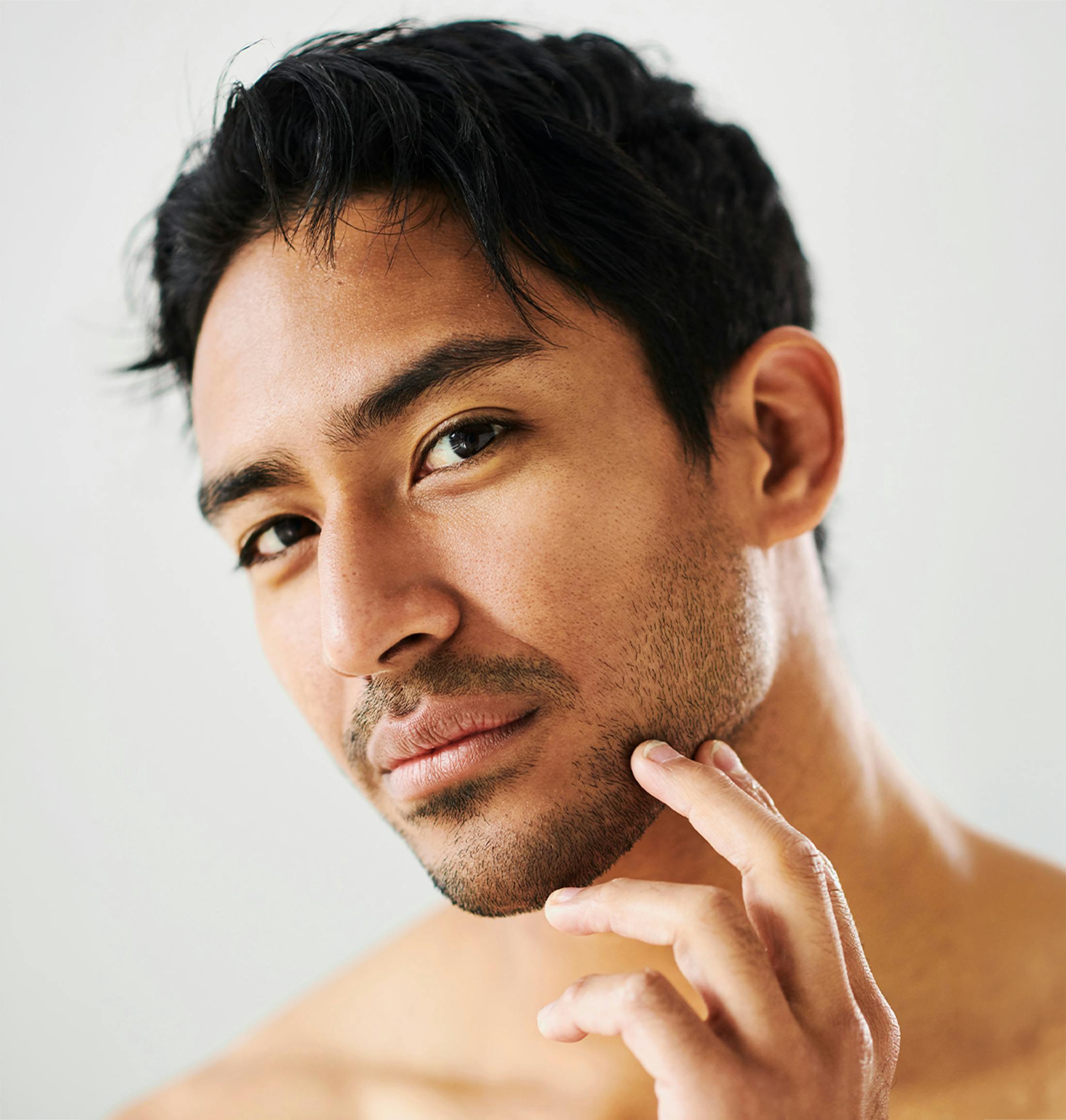 man holding his chin