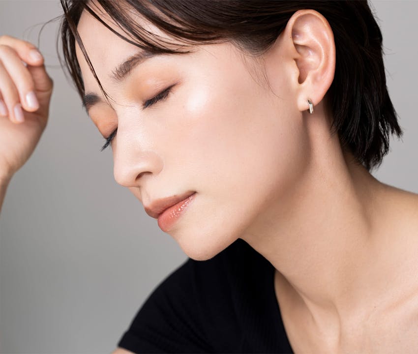 woman with eyes closed