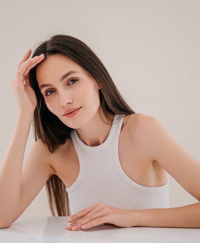 Woman touching her head