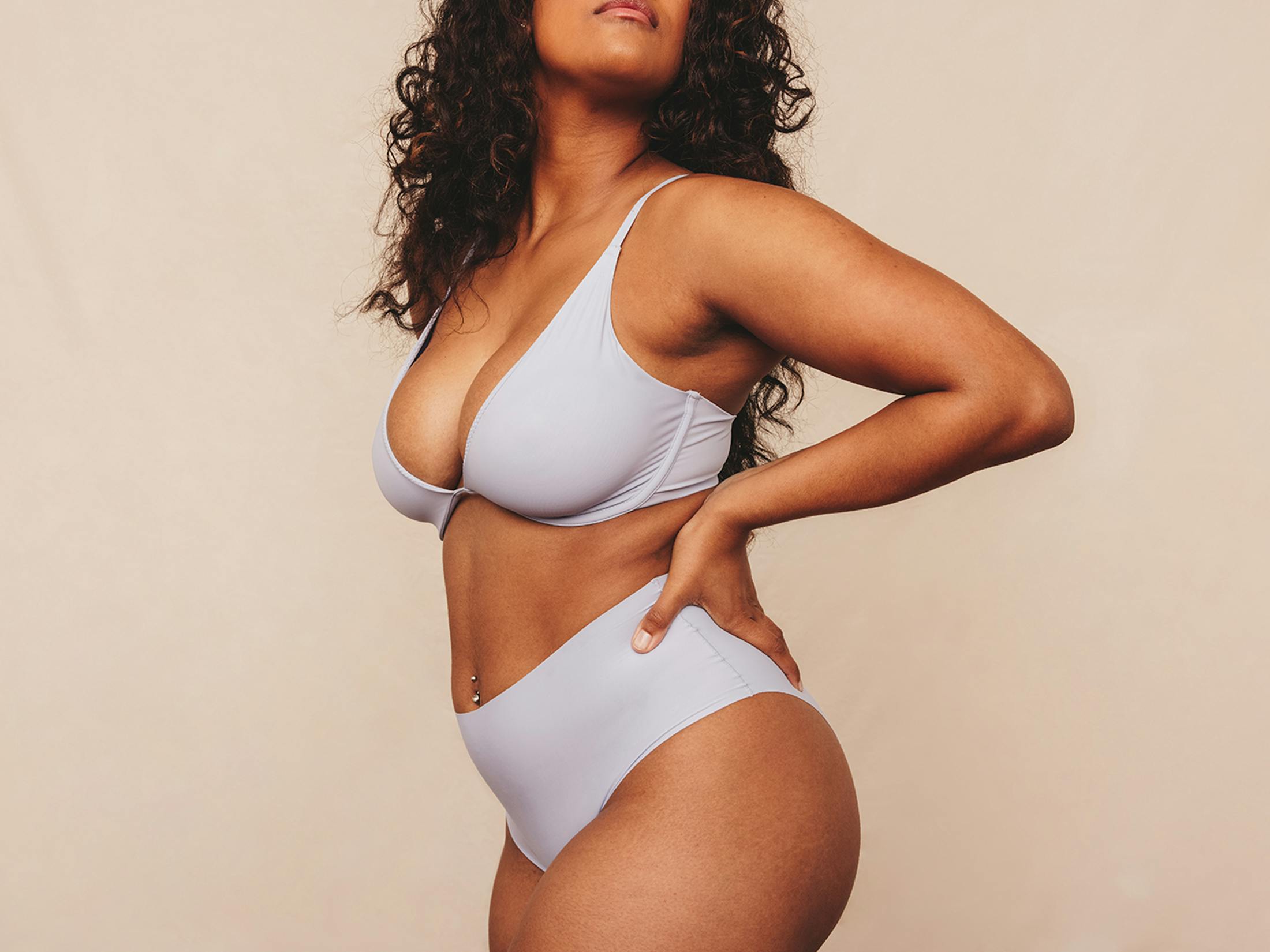 Woman posing with her hand on her hip