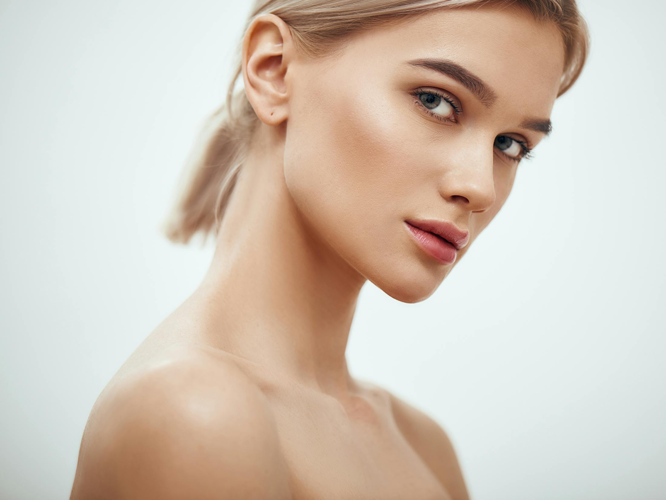 Woman looking over her shoulder