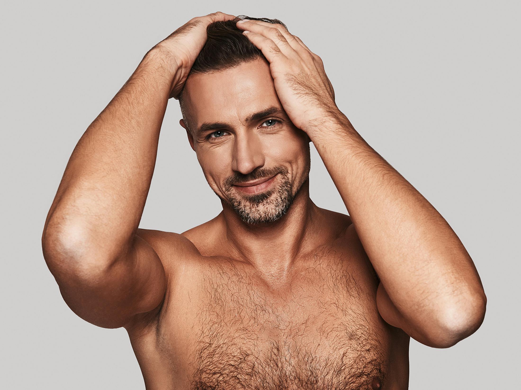 Man touching his hair