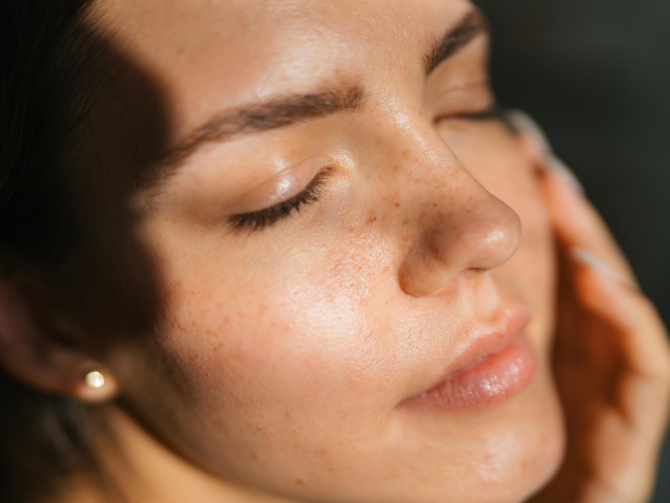 Woman with her eyes closed