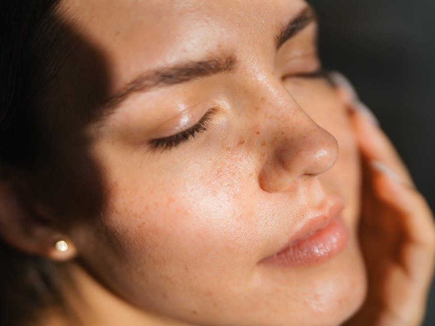 Woman with her eyes closed
