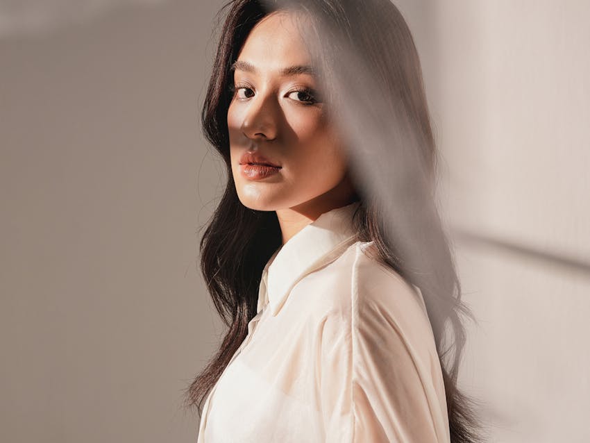 Woman looking over her shoulder