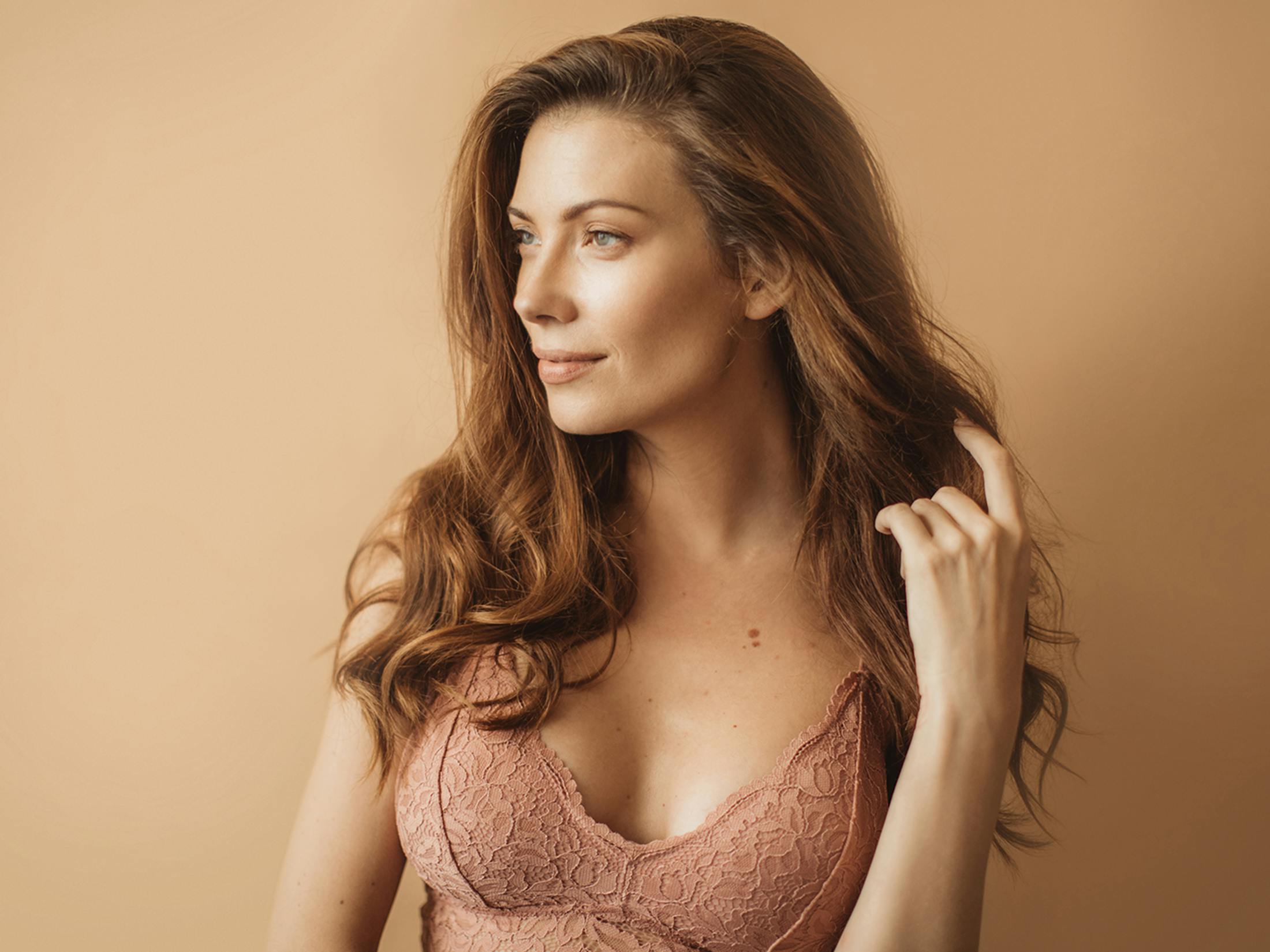 Woman touching her hair