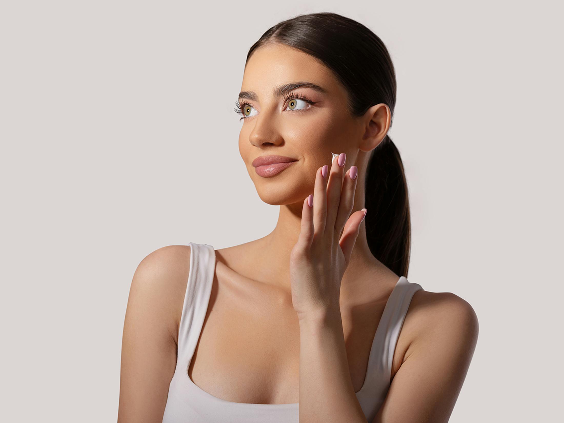 Woman touching her face