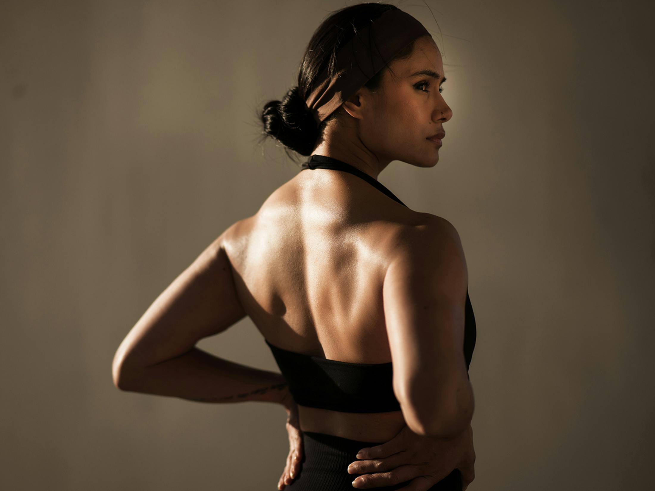 Woman looking over her shoulder